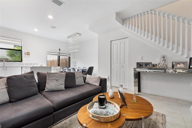 living room with light tile patterned floors