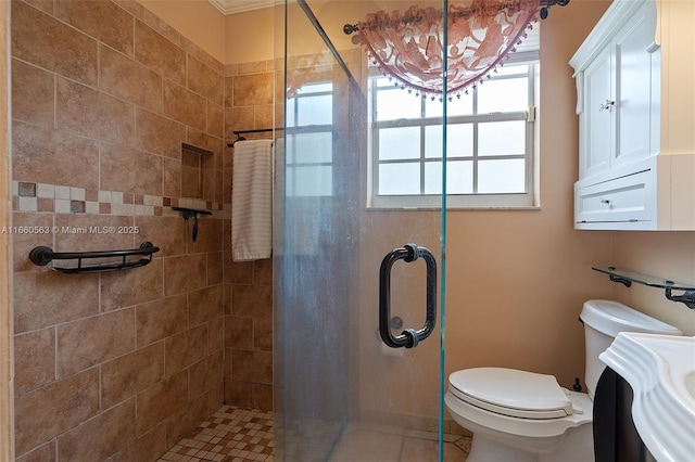 bathroom featuring walk in shower and toilet