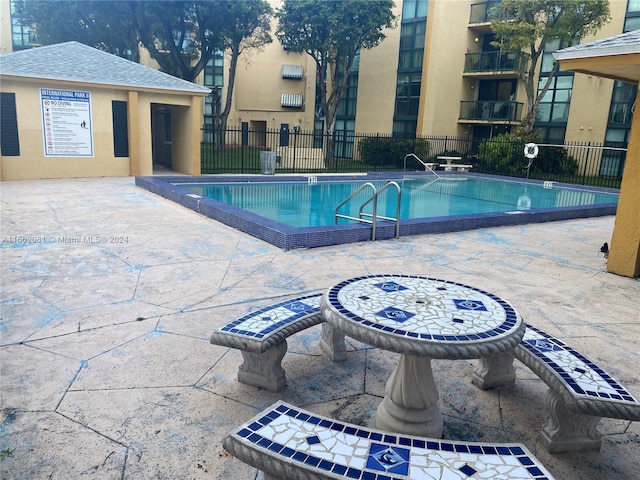 view of pool with a patio area