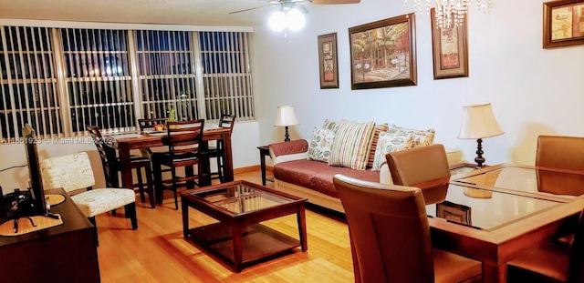 interior space featuring hardwood / wood-style floors and ceiling fan