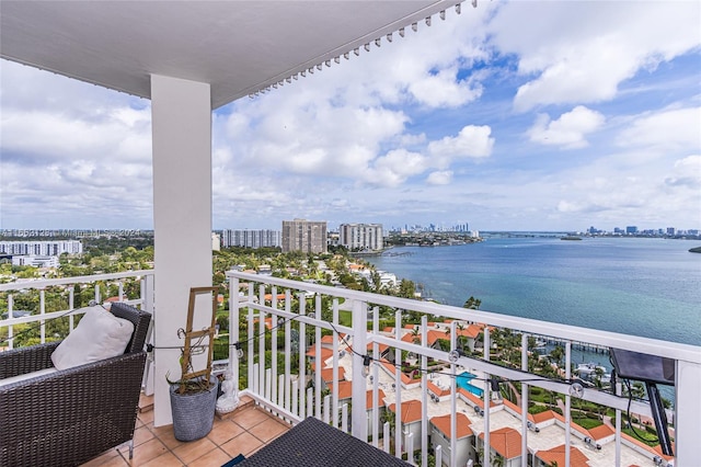 balcony featuring a water view