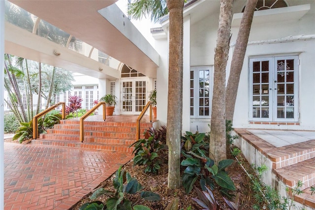 entrance to property featuring french doors