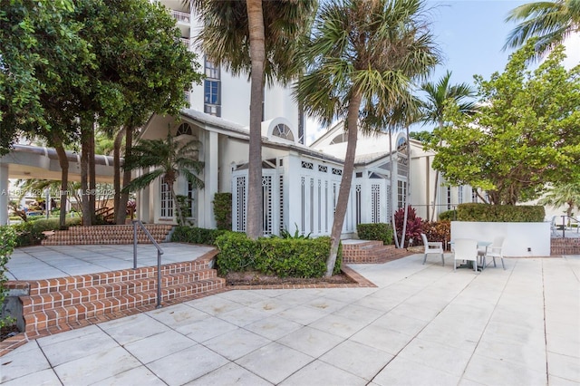 view of front of home with a patio area