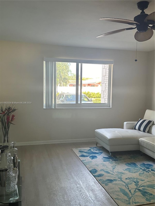 bedroom featuring ceiling fan and wood-type flooring