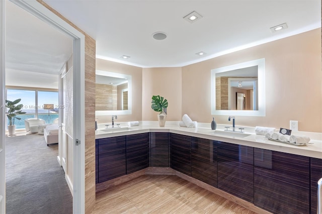 bathroom featuring a water view and vanity