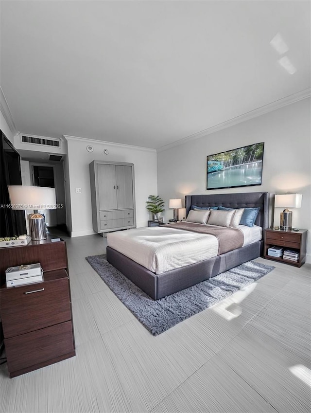 bedroom with ornamental molding