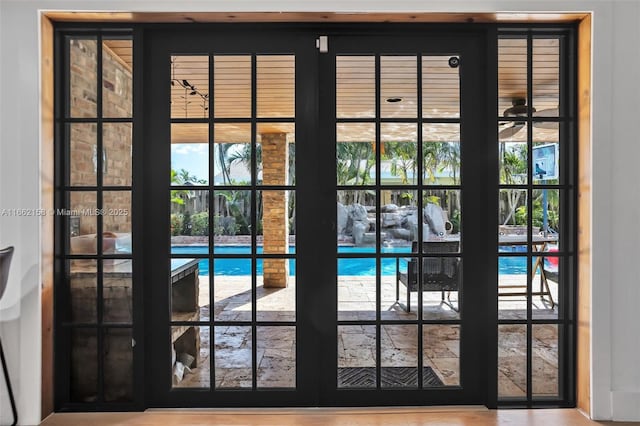 entryway featuring a healthy amount of sunlight and french doors