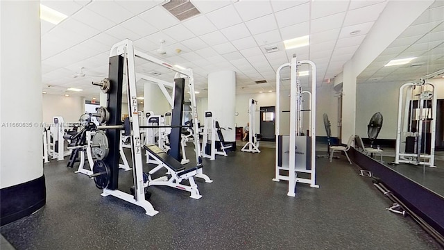 gym with a drop ceiling