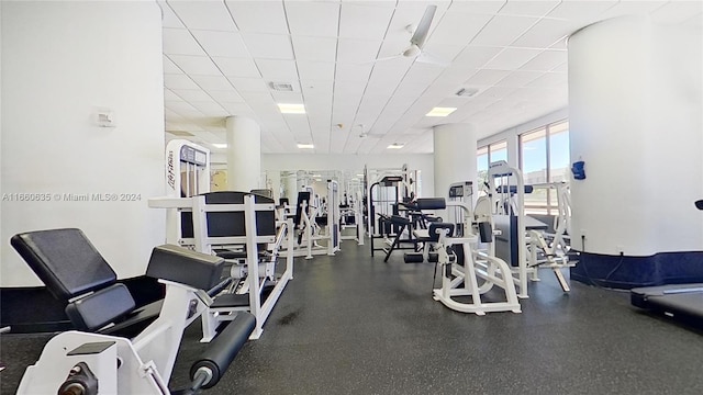 gym featuring a drop ceiling