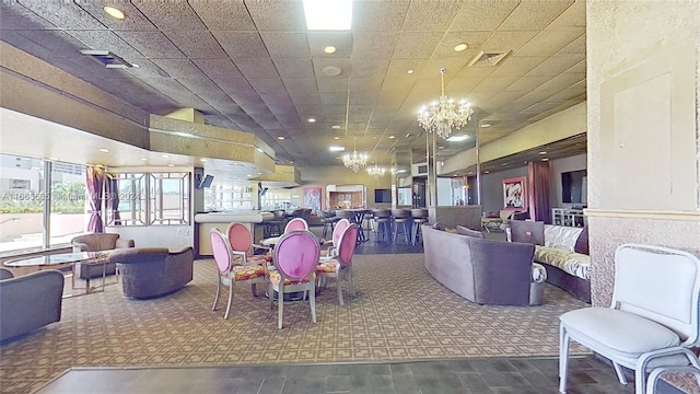 dining room with a notable chandelier