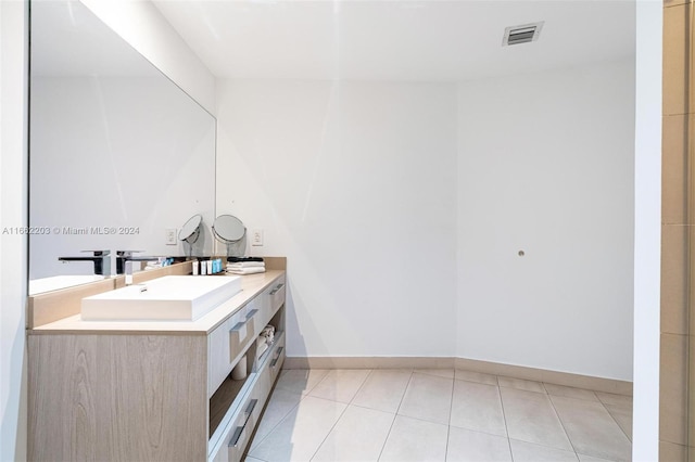 bathroom featuring tile patterned floors and vanity