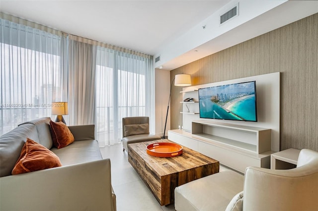 living room featuring visible vents