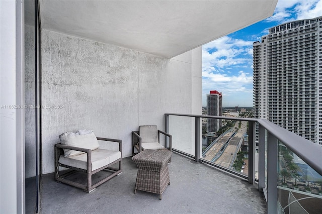 balcony featuring a view of city