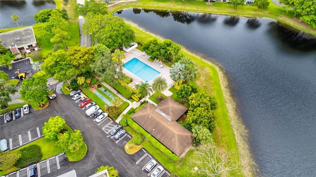 birds eye view of property featuring a water view