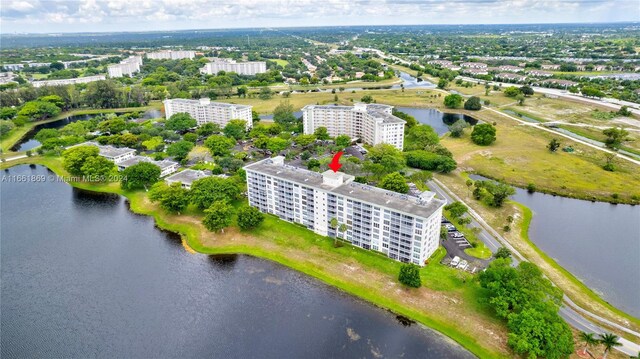 drone / aerial view with a water view