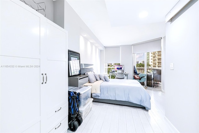 bedroom with light hardwood / wood-style flooring