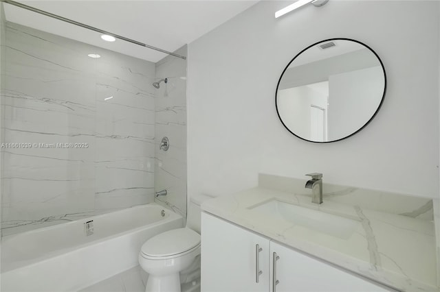 bathroom featuring visible vents, vanity, toilet, and shower / bathtub combination