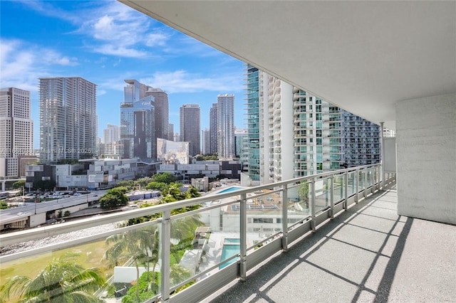 balcony featuring a view of city