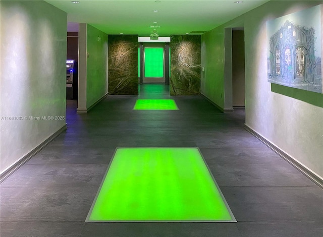 game room featuring concrete flooring