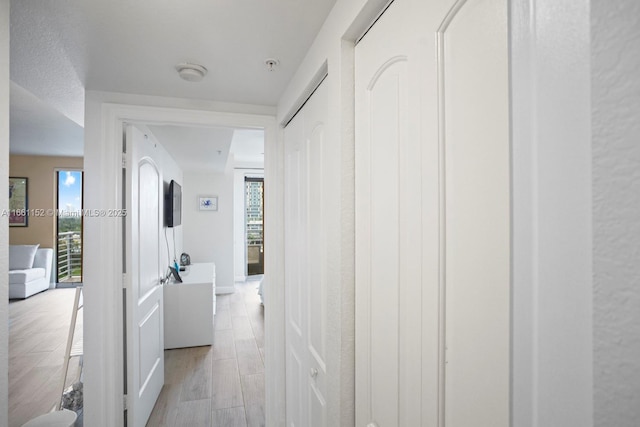 hallway featuring light hardwood / wood-style floors