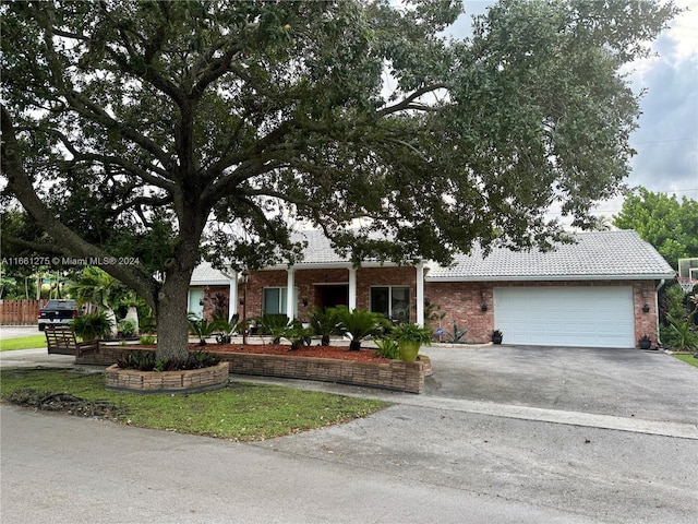 view of front of home with a garage