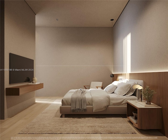 bedroom featuring light hardwood / wood-style floors