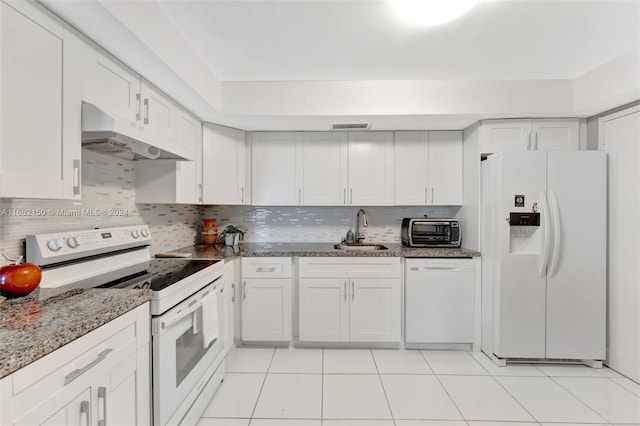 kitchen with white cabinets, white appliances, tasteful backsplash, and sink