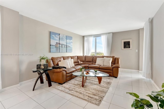 living room with light tile patterned flooring