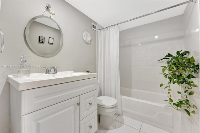 full bathroom featuring tile patterned floors, vanity, shower / bath combo, and toilet