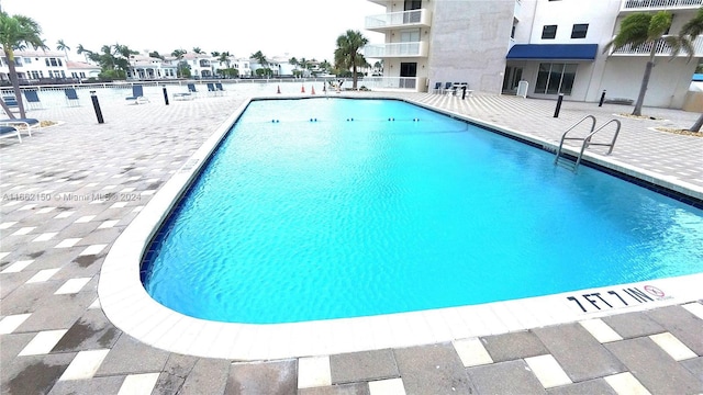 view of pool with a patio area