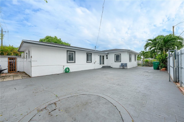 view of front of home with a patio