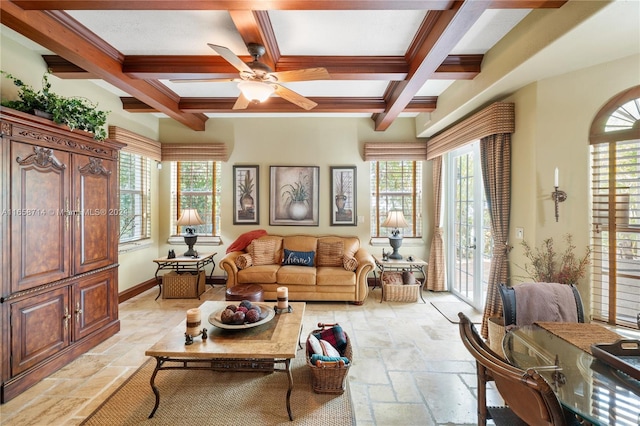 living room with coffered ceiling, beam ceiling, and a healthy amount of sunlight