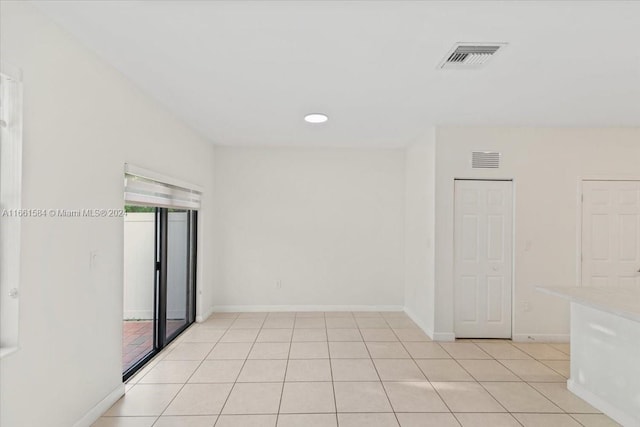 view of tiled spare room