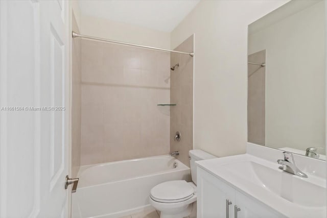 full bathroom featuring vanity, toilet, and tiled shower / bath