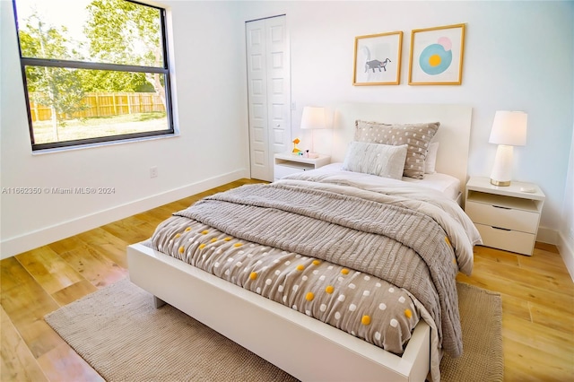 bedroom featuring hardwood / wood-style floors