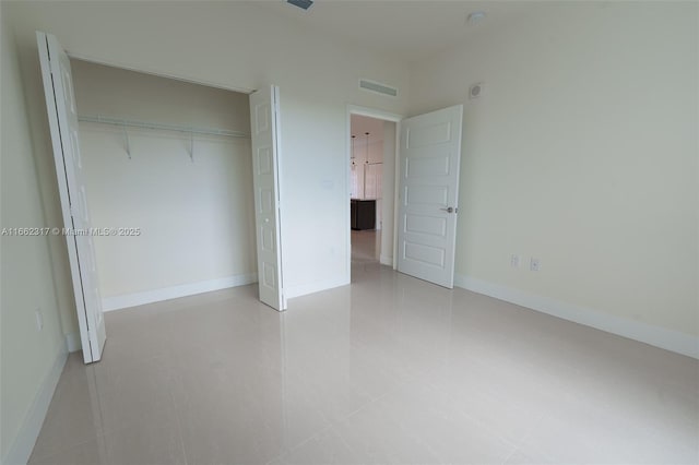 unfurnished bedroom featuring a closet