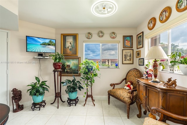 living area with light tile patterned flooring