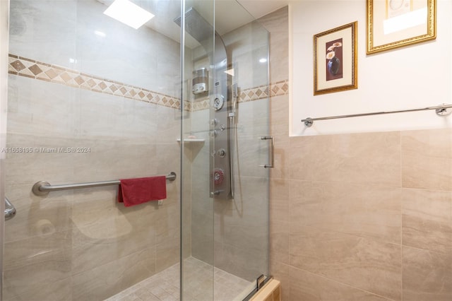 bathroom with an enclosed shower