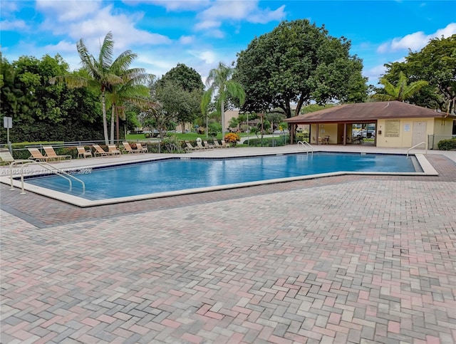 view of pool featuring a patio area