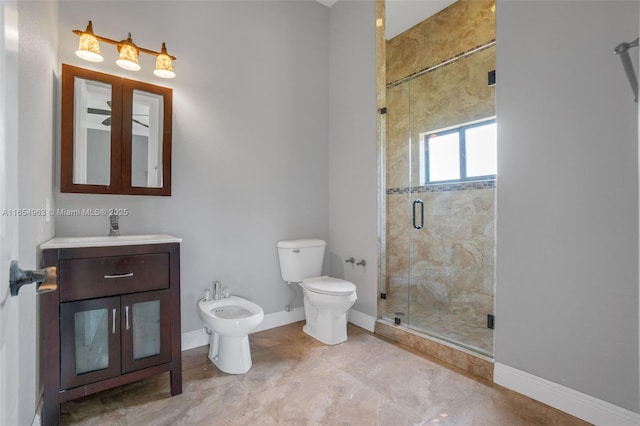 bathroom with toilet, a stall shower, a bidet, vanity, and baseboards