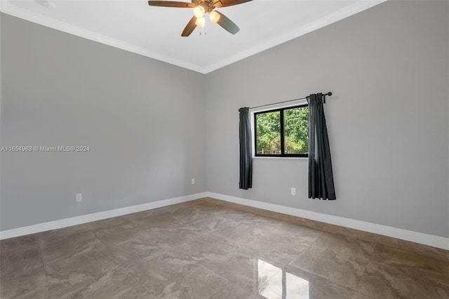 spare room featuring ceiling fan and crown molding