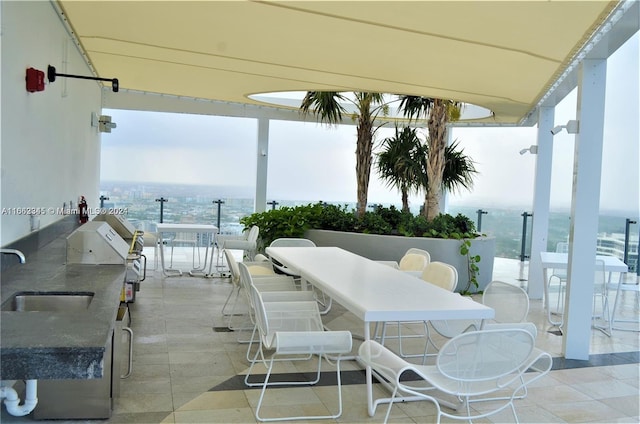 view of patio / terrace featuring an outdoor wet bar