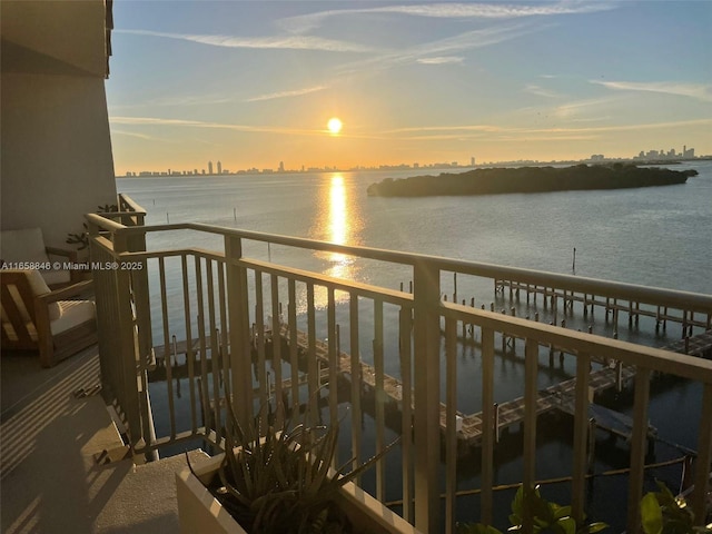 balcony at dusk with a water view