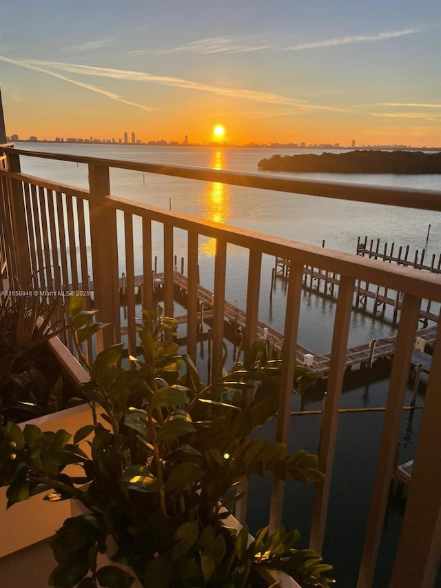 balcony at dusk with a water view