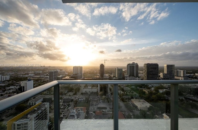 view of balcony at dusk