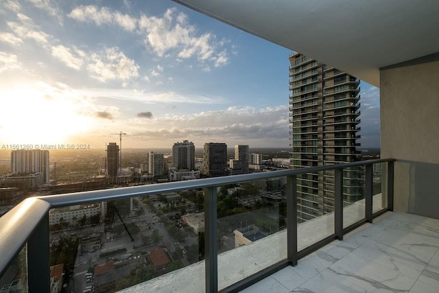 view of balcony at dusk