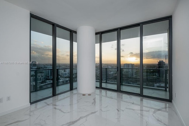 empty room with floor to ceiling windows