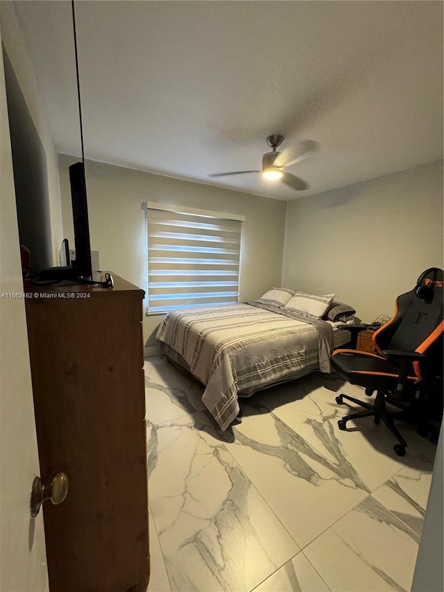 bedroom featuring ceiling fan