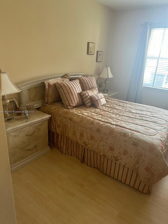 bedroom featuring light wood-type flooring