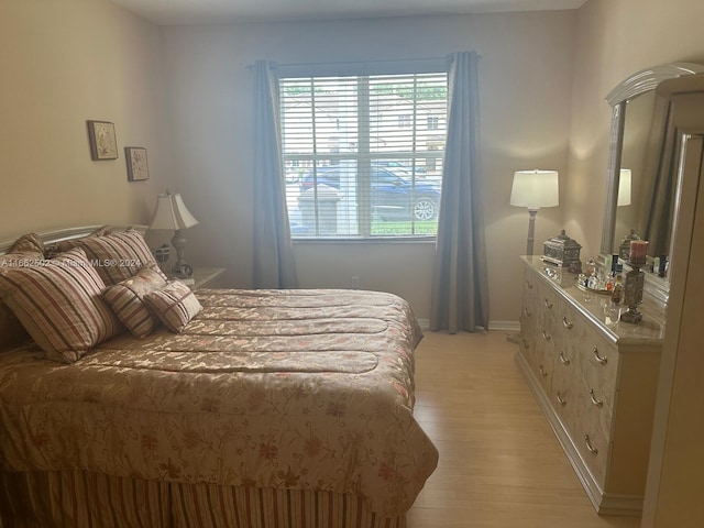 bedroom featuring light hardwood / wood-style floors